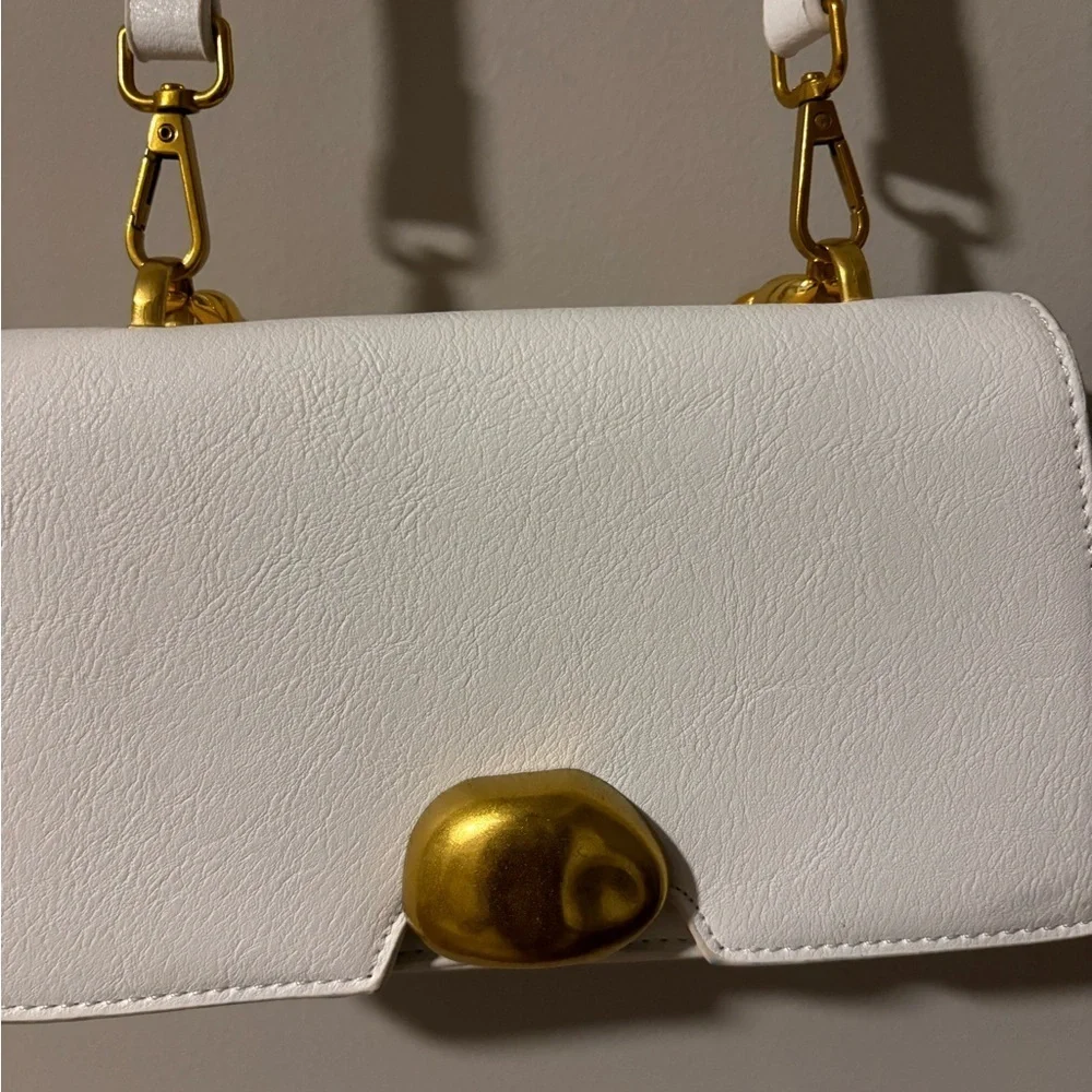 Chic lightweight vegan leather unique small back with removable strap
